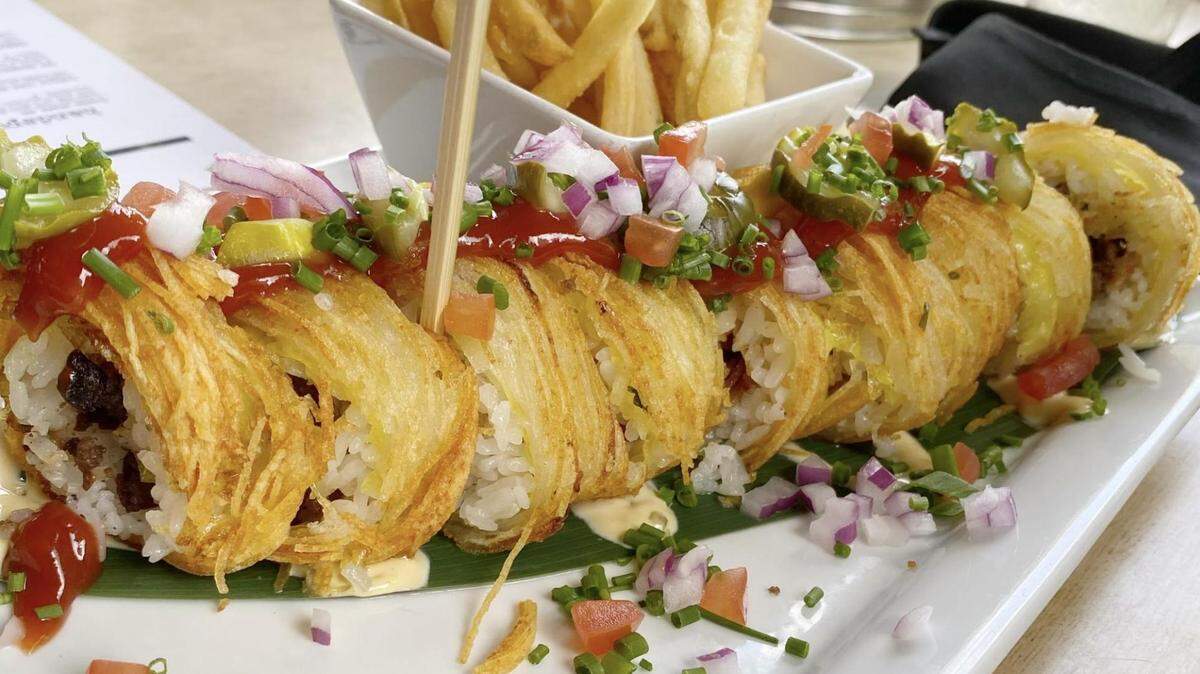 CharlotteFive's Brent Peters said his favorite meal in Charlotte this year was the All-American bacon double Cheeseburgooshi from The Cowfish.