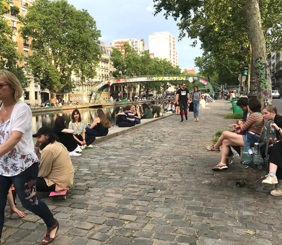 France requires travelers to present a negative PCR COVID-19 test and provide proof of vaccination in order to enter the country during the pandemic. Shown above is a file photo at Canal Saint-Martin in Paris.