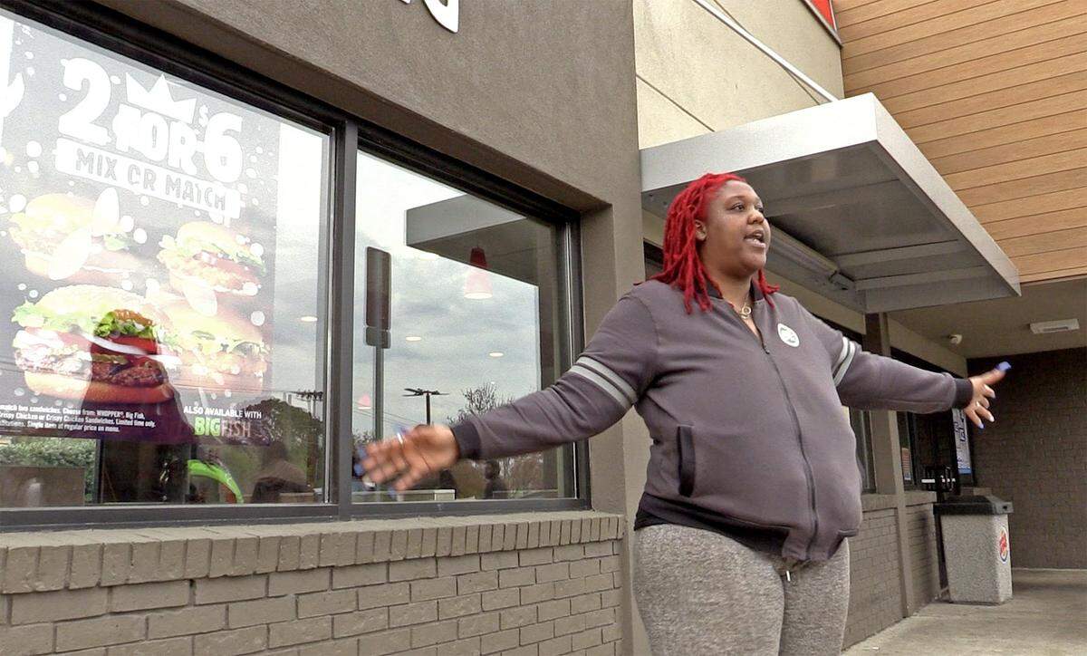 Precious Robinson talks about what she saw at the Burger King on Beatties Ford Road near Interstate 85 in Charlotte March 25. Robinson spoke about a man who was allegedly armed being shot and killed during an encounter with a Charlotte-Mecklenburg police officer.