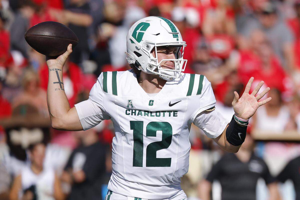 Charlotte 49ers quarterback Grayson Loftis passes during the second quarter against the Georgia Bulldogs at Sanford Stadium on Nov. 22, 2025 in Athens, Georgia.