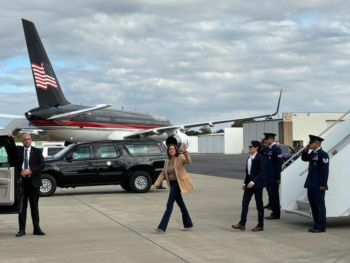 Kamala Harris gets off her plane at the Charlotte Douglas International Airport at 3:36 p.m. Saturday, Nov. 2. In the background is former President Donald Trump’s airplane. The two both held rallies in the Charlotte area Saturday.