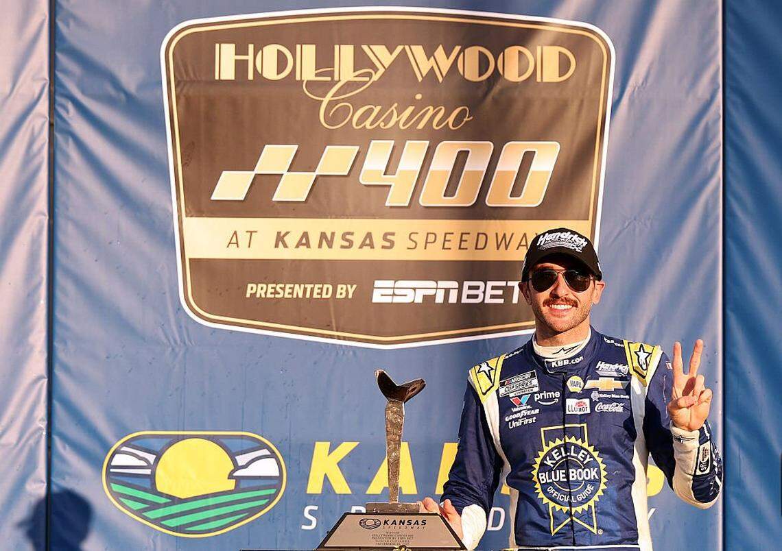 Chase Elliott, driver of the #9 Kelley Blue Book Chevrolet, celebrates in victory lane after winning the NASCAR Cup Series Hollywood Casino 400 Presented by ESPN BET at Kansas Speedway on September 28, 2025 in Kansas City, Kansas.