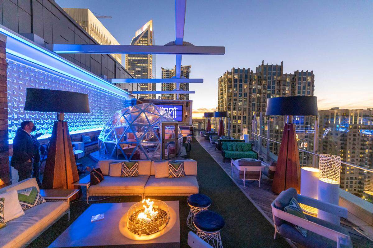 Merchant & Trade is located in uptown Charlotte with a heated rooftop patio area.