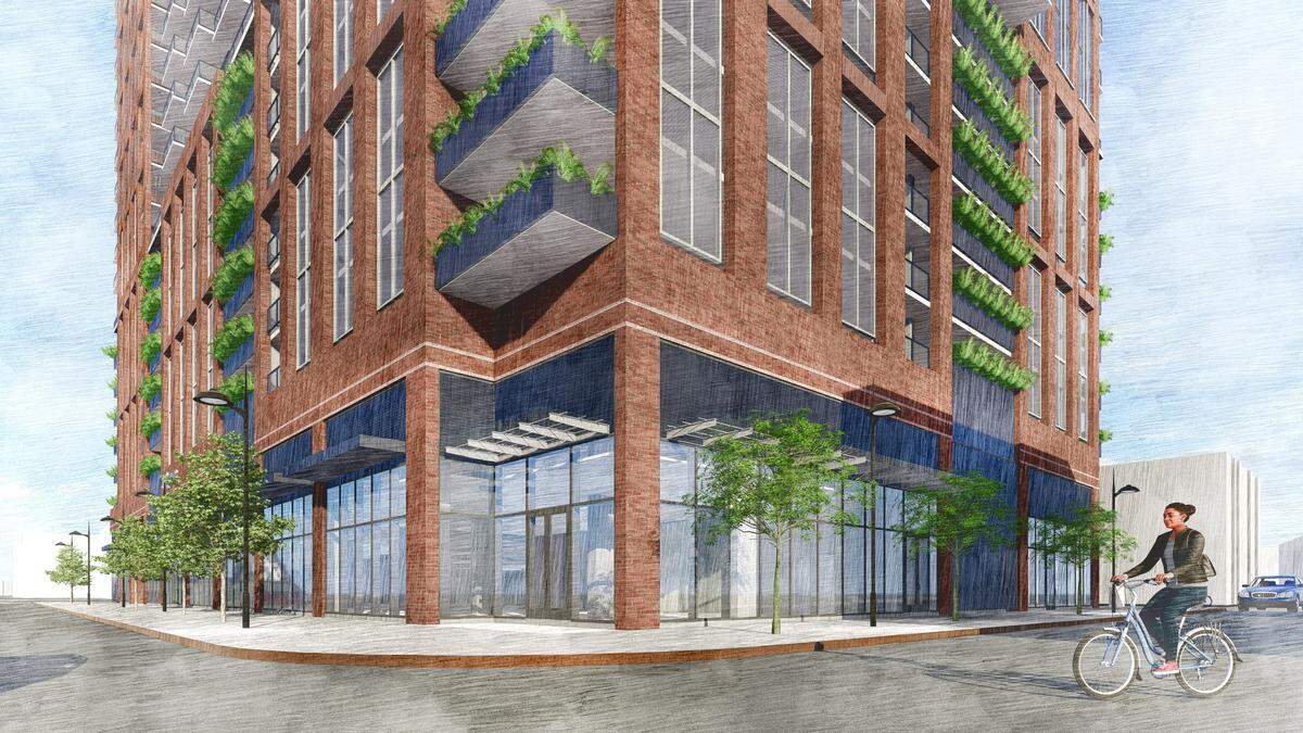 The design of the 24-story high-rise in South End features masonry exterior and oversized windows.