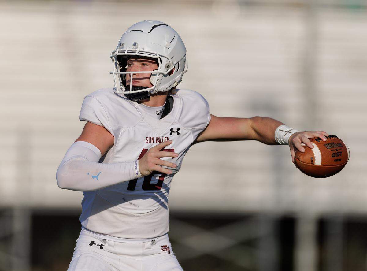 Senior quarterback Noah Lineberry drops back during a preseason scrimmage against Ardrey Kell. A standout for the Spartans, Lineberry has drawn interest from several Division I programs thanks to his strong arm and field awareness. With recruitment heating up, he's expected to be a key leader in Sun Valley's 2025 campaign. August 15, 2025.
