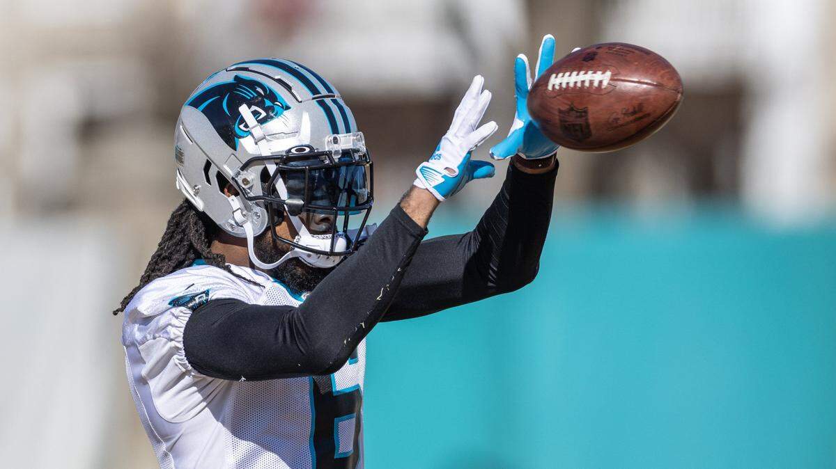 Carolina Panthers cornerback Josh Norman catches during practice in Charlotte, N.C., on Wednesday, December 28, 2022.