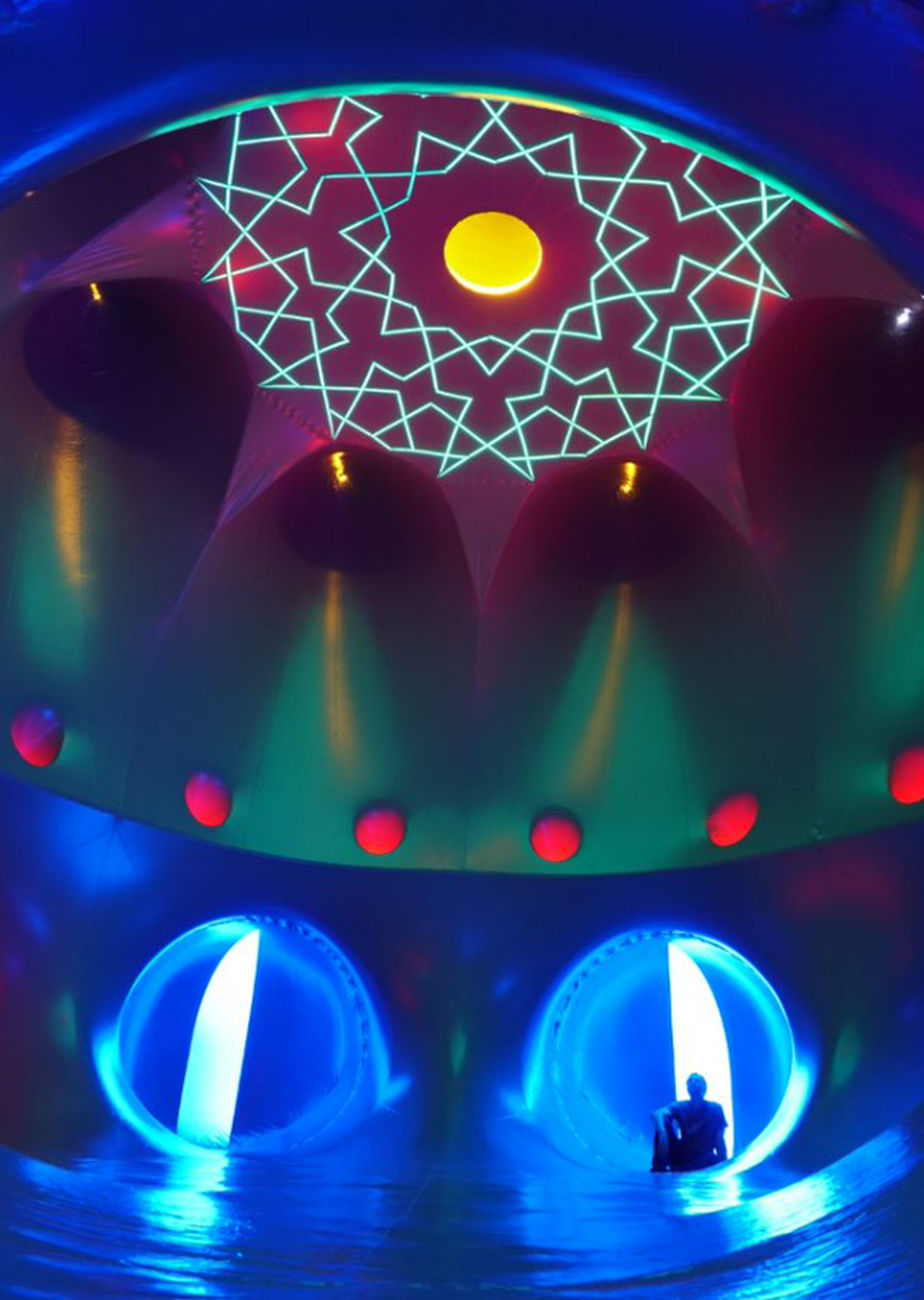 Luminarium — Architects of Air by Alan Parkinson, a sensory experience of light, color and sound, has been exhibited globally, from the Guggenheim Museum Bilbao in Spain to the Sydney Opera House.