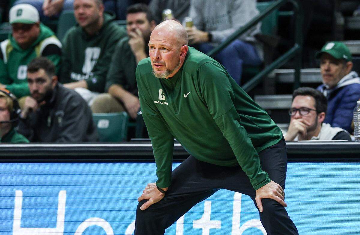Charlotte head coach Aaron Fearne watches his team from the sideline during the gainst against Davidson at Dale F. Halton Arena in Charlotte, NC on Tuesday, November 11, 2025.