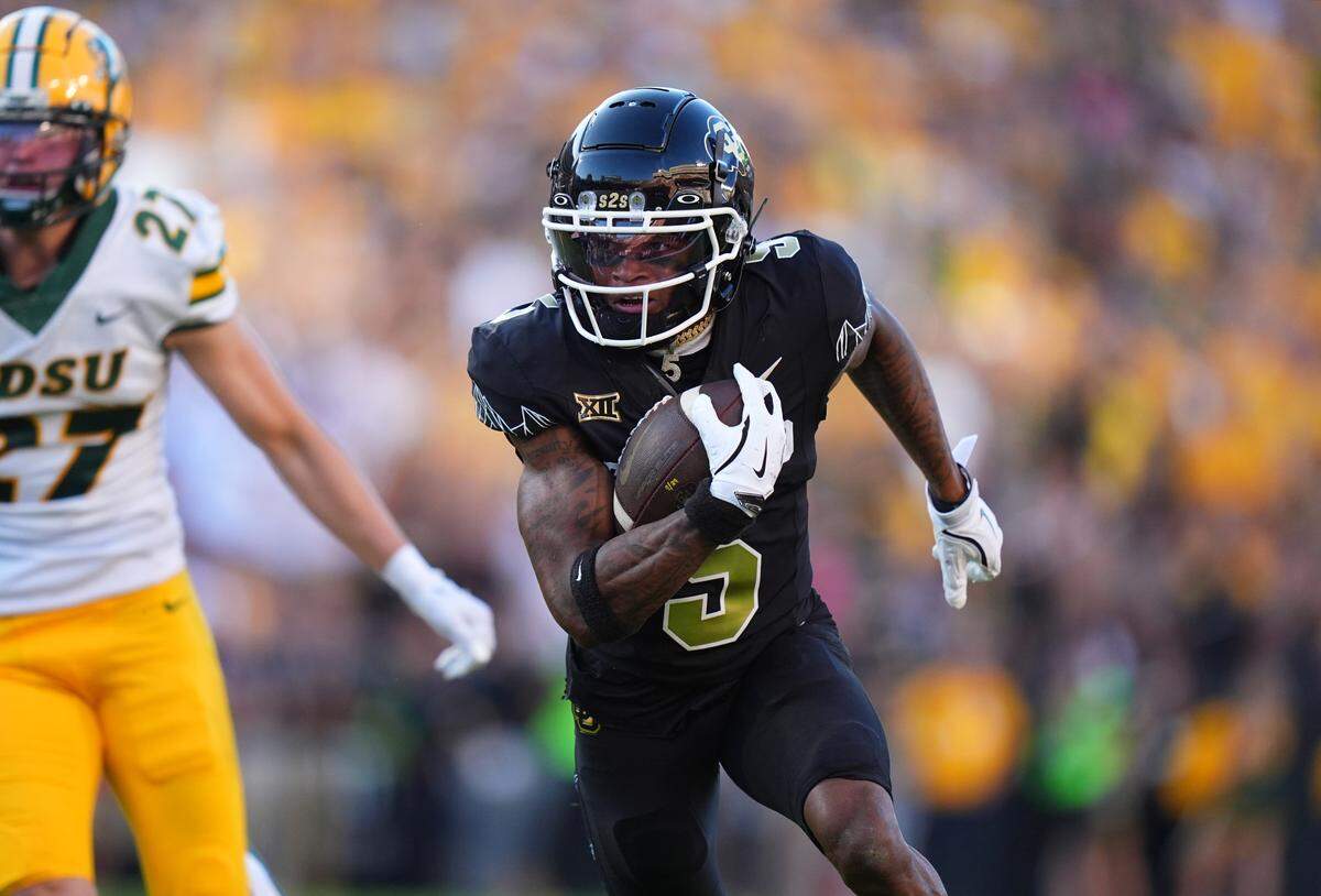 Colorado wide receiver Jimmy Horn Jr. (5) runs after a reception in a 2024 game against North Dakota State at Folsom Field. Ron Chenoy-USA TODAY Sports