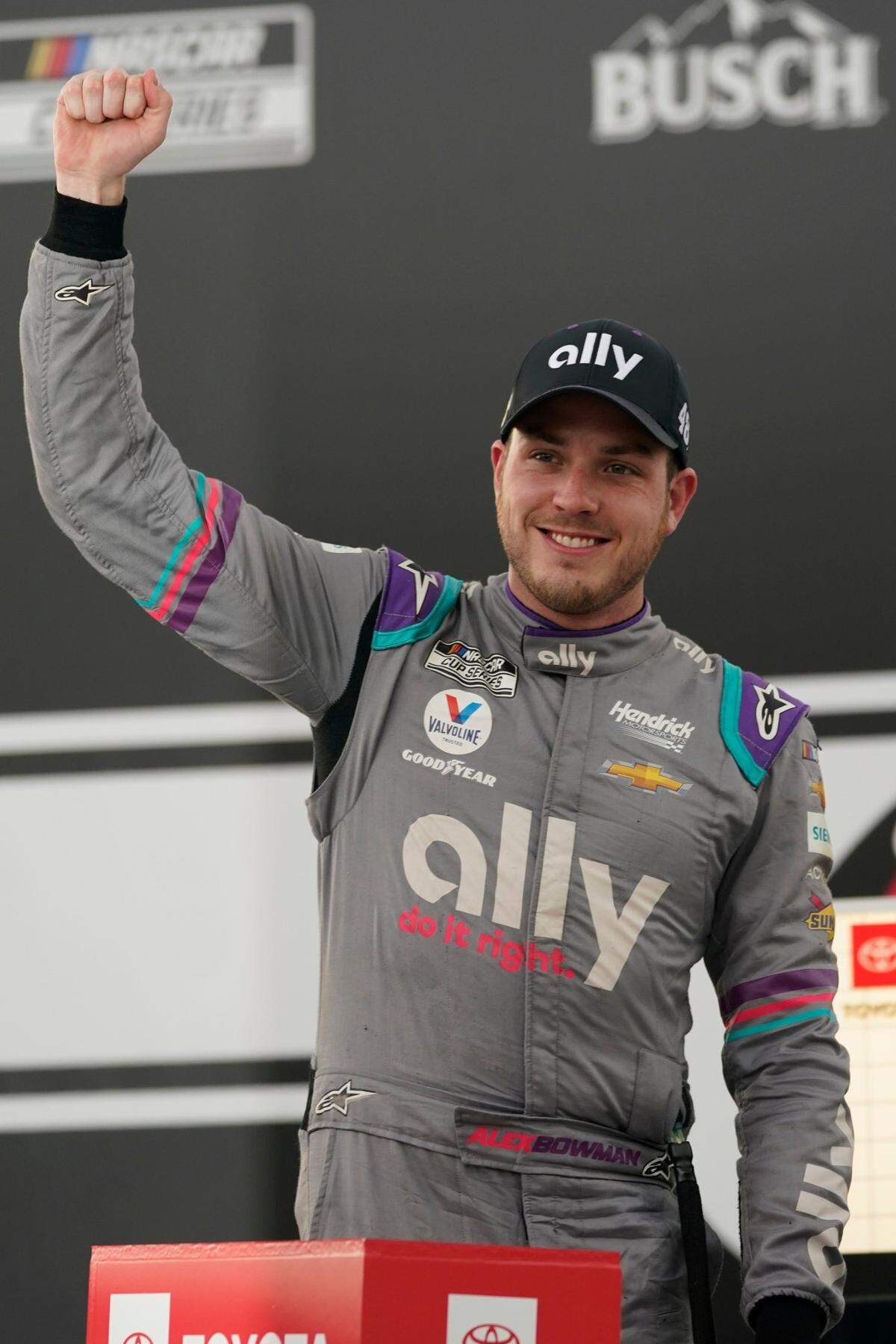 Alex Bowman (48) celebrates after winning a NASCAR Cup Series auto race at Richmond International Raceway in Richmond, Va., Sunday, April 18, 2021. (AP Photo/Steve Helber)