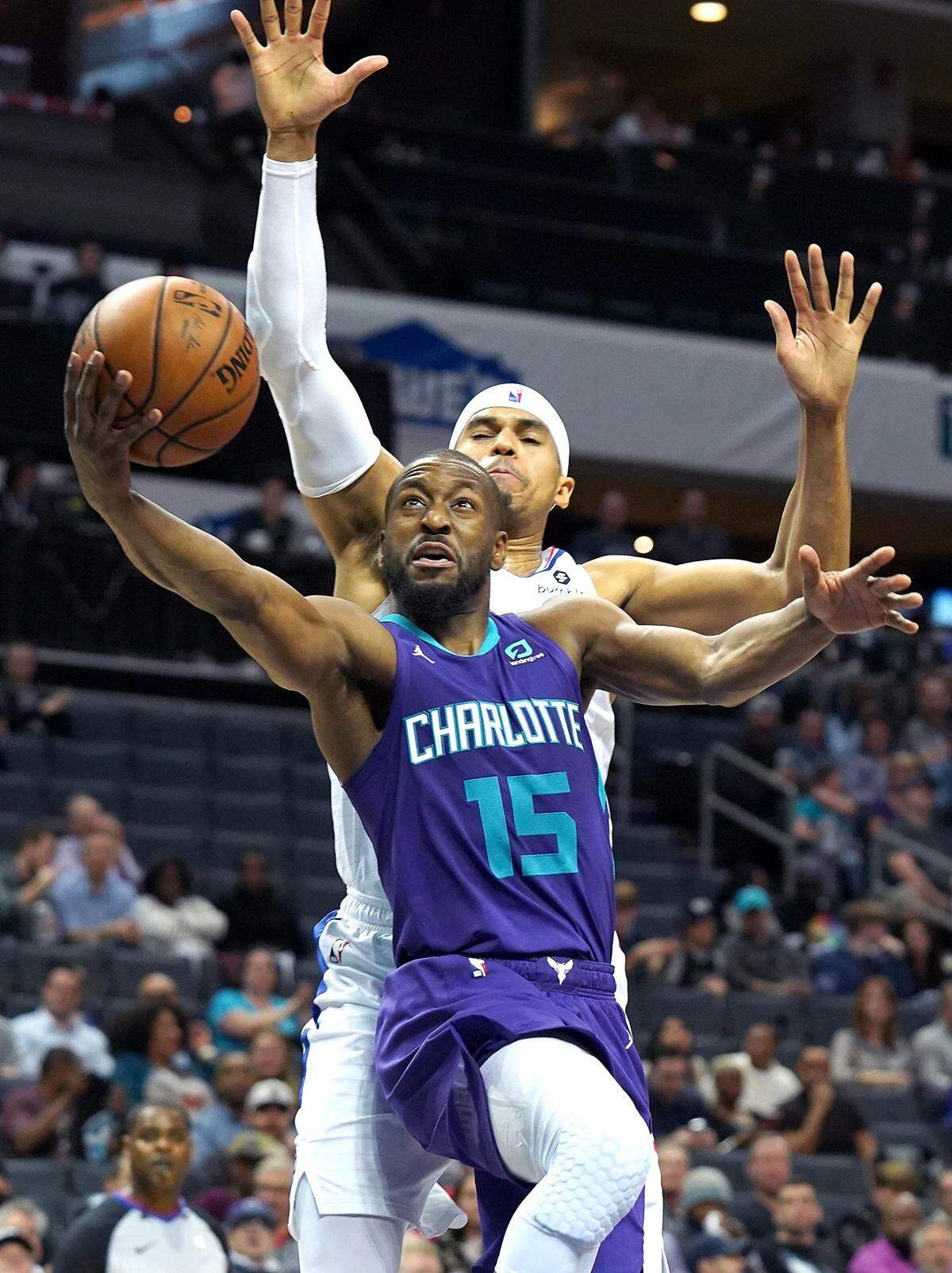 Charlotte Hornets guard Kemba Walker drives to the basket in 2019. After the 2019 season, the Hornets dealt Walker in a sign-and-trade to Boston, getting Terry Rozier in return. Much of Walker’s time with the Celtics, however, was derailed by injury.