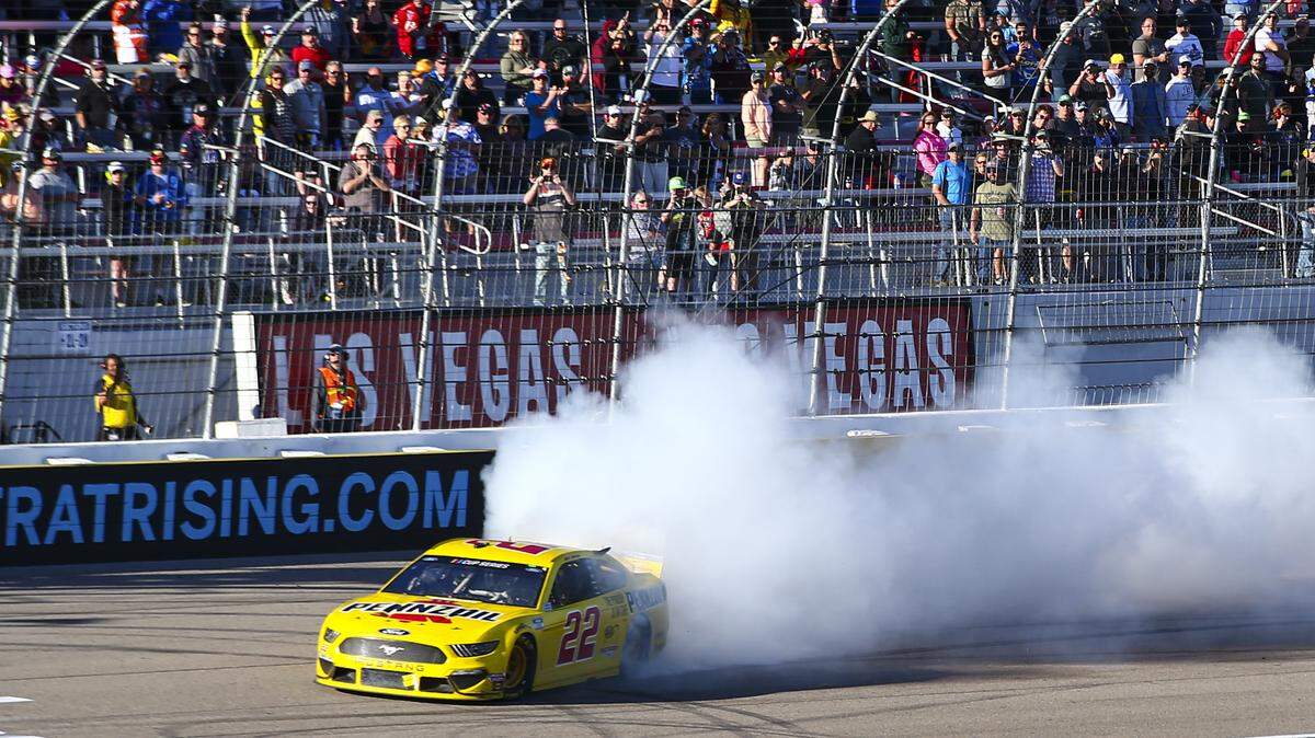 Joey Logano (22) does a burnout after winning a NASCAR Cup Series auto race at Las Vegas Motor Speedway on Sunday, Feb. 23, 2020. (AP Photo/Chase Stevens)