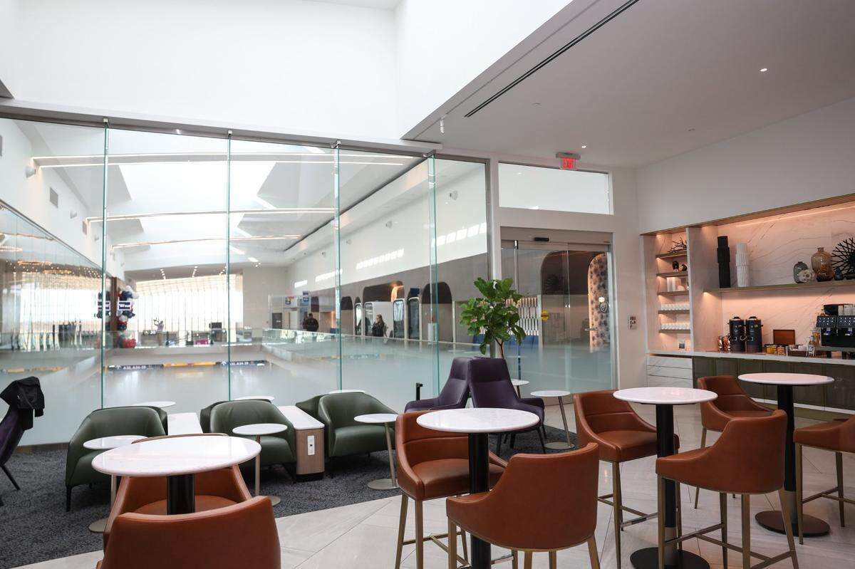 One of the many seating areas, equipped with outlets and USB ports at the Delta Sky Club.