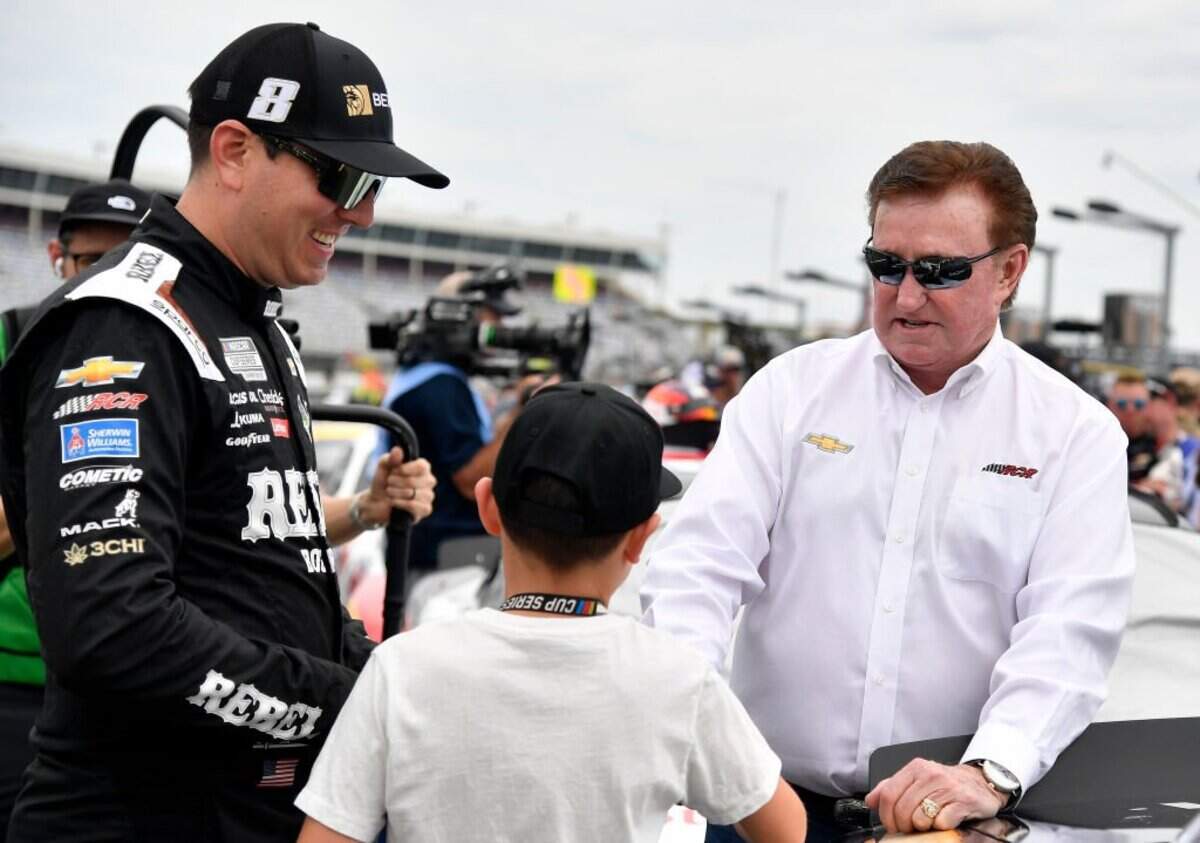 Kyle Busch, driver of the #33 BetMGM/Rebel Bourbon Chevrolet, (L) and son, Brexton Busch meets with RCR team owner and NASCAR Hall of Famer, Richard Childress on the grid prior to the NASCAR Xfinity Series BetMGM 300 at Charlotte Motor Speedway on May 25, 2024 in Concord, North Carolina.