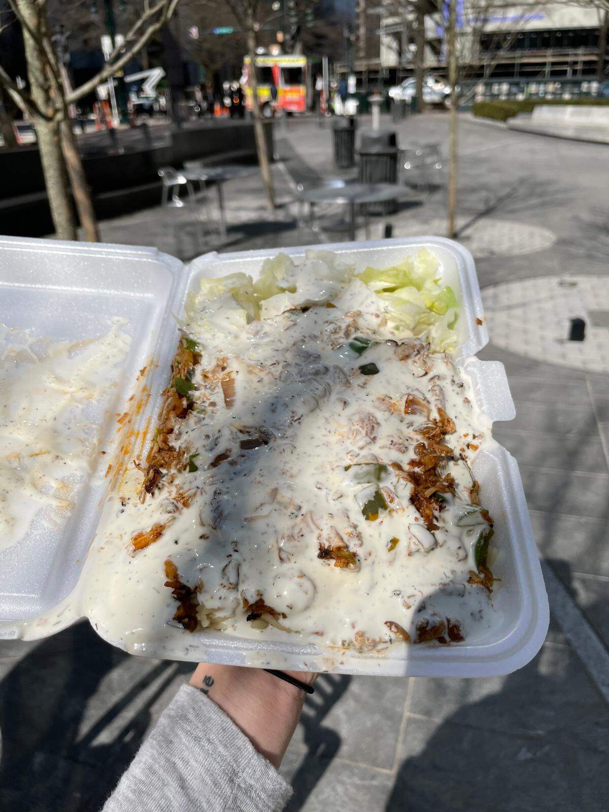 The Halal Food Cart’s most popular menu item is the Chicken and Lamb Combo over rice.