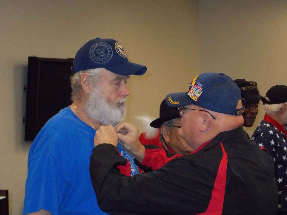 A Vietnam War veteran gets “pinned” at a Vietnam War Commemoration ceremony in 2019 in Greensboro. Vietnam vets from Greensboro and Cary were honored at the ceremony, part of an ongoing national effort to recognize Vietnam vets and their families for their service and sacrifice.