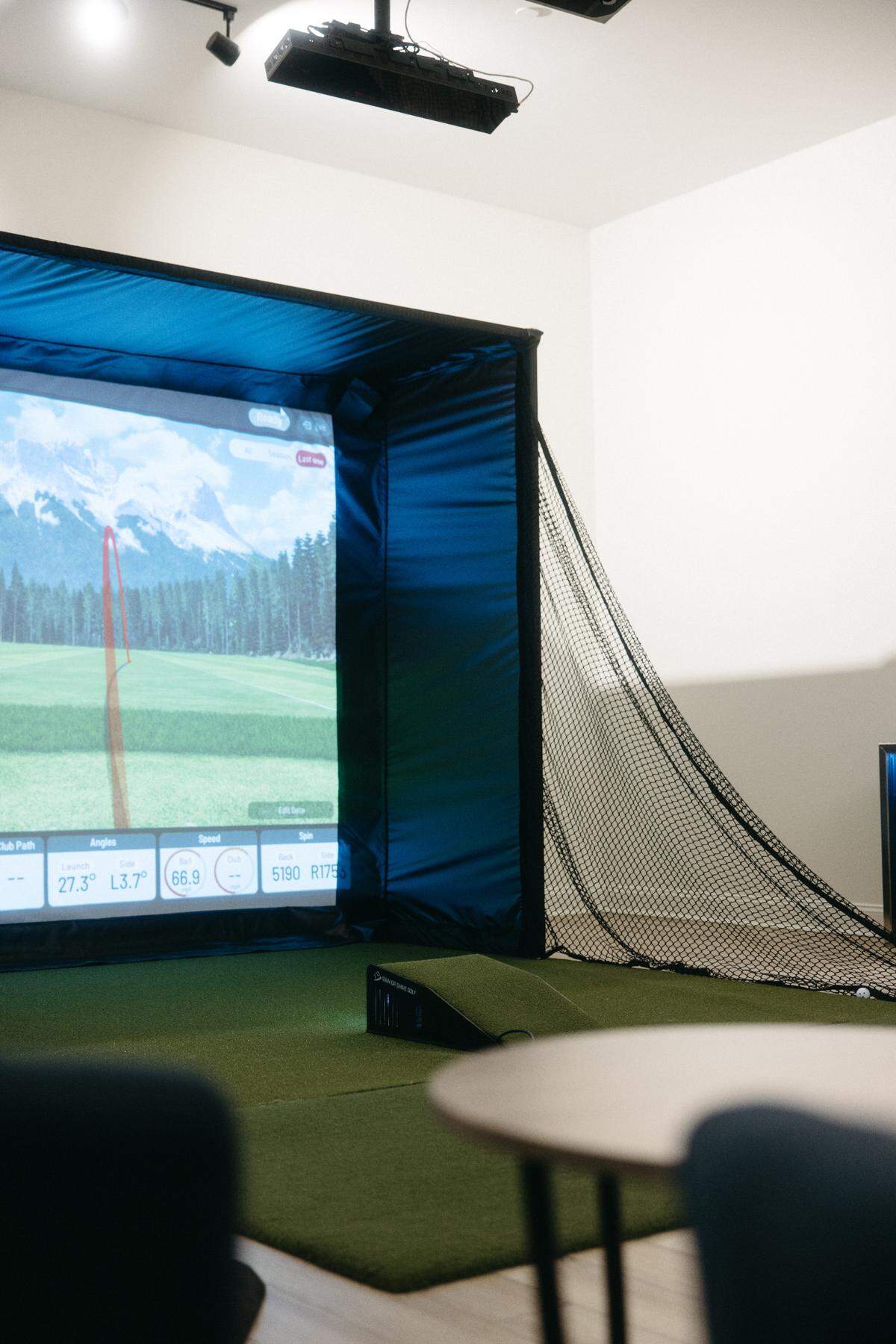 Rain or Shine, an indoor simulated golf company in Charlotte, makes systems for residences.