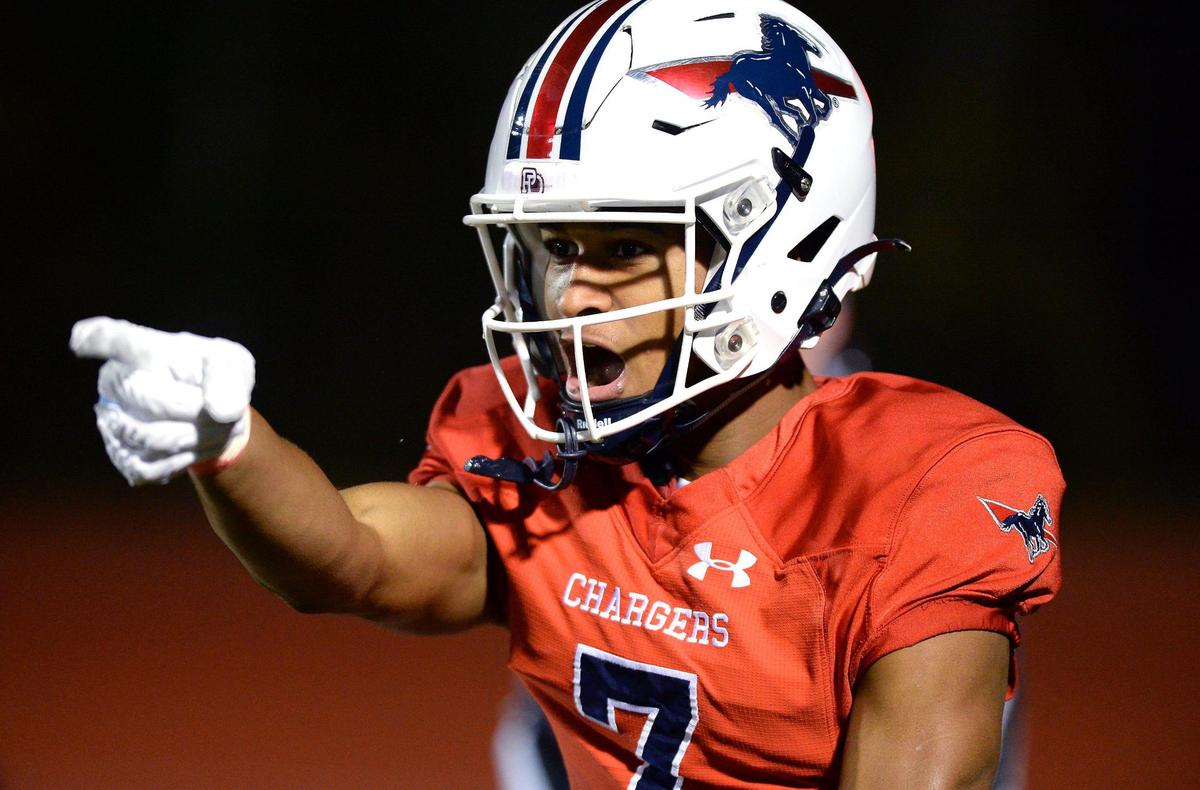 Providence Day Chargers wide receiver Channing Goodwin celebrates his touchdown pass reception against Rabun Gap during second quarter action at Providence Day School in Charlotte, NC on Friday, November 19, 2021. The Chargers hosted Rabun Gap in the NCISAA boys state championship game.