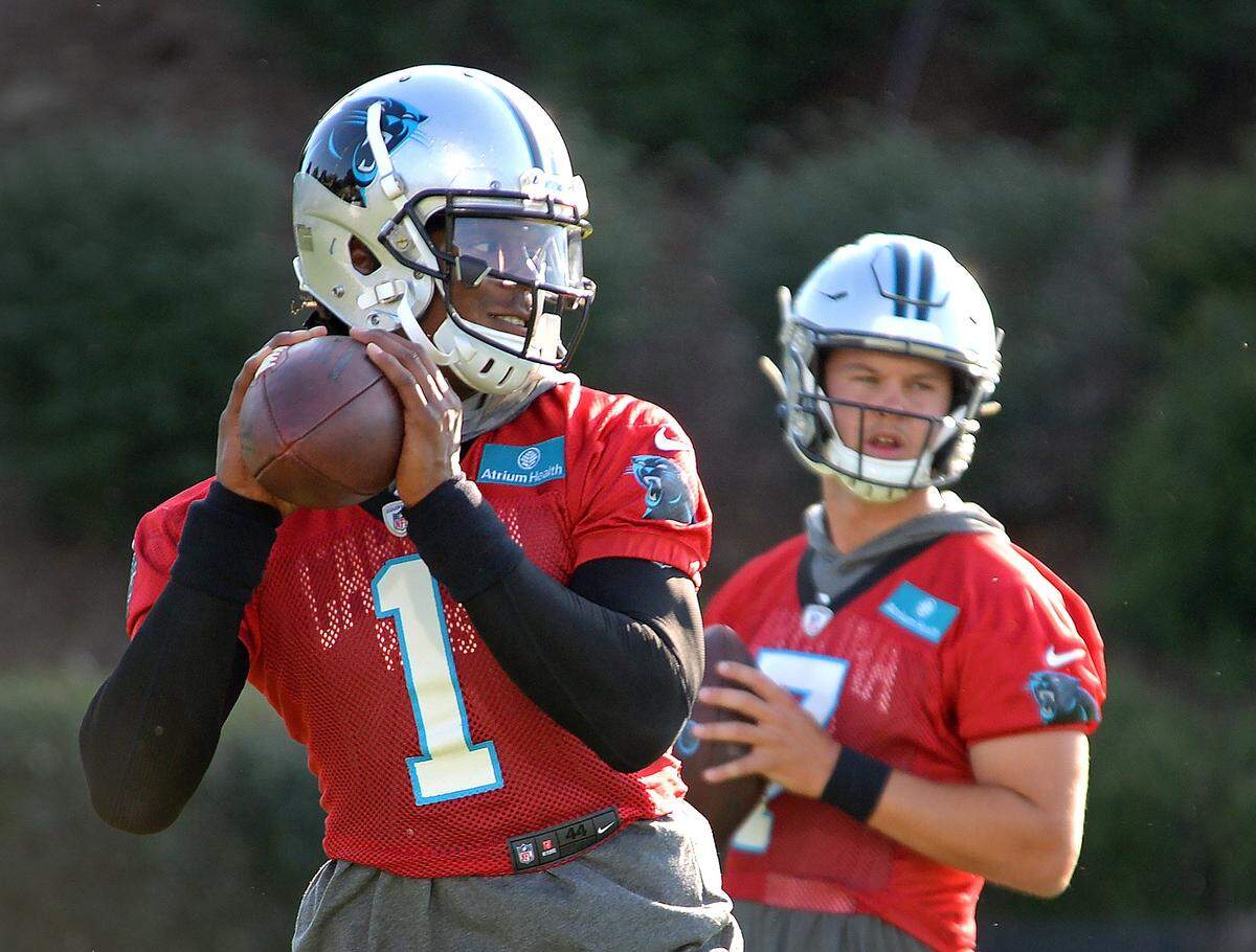 Carolina Panthers quarterback Cam Newton, left, has 124 career NFL starts. Kyle Allen has five.