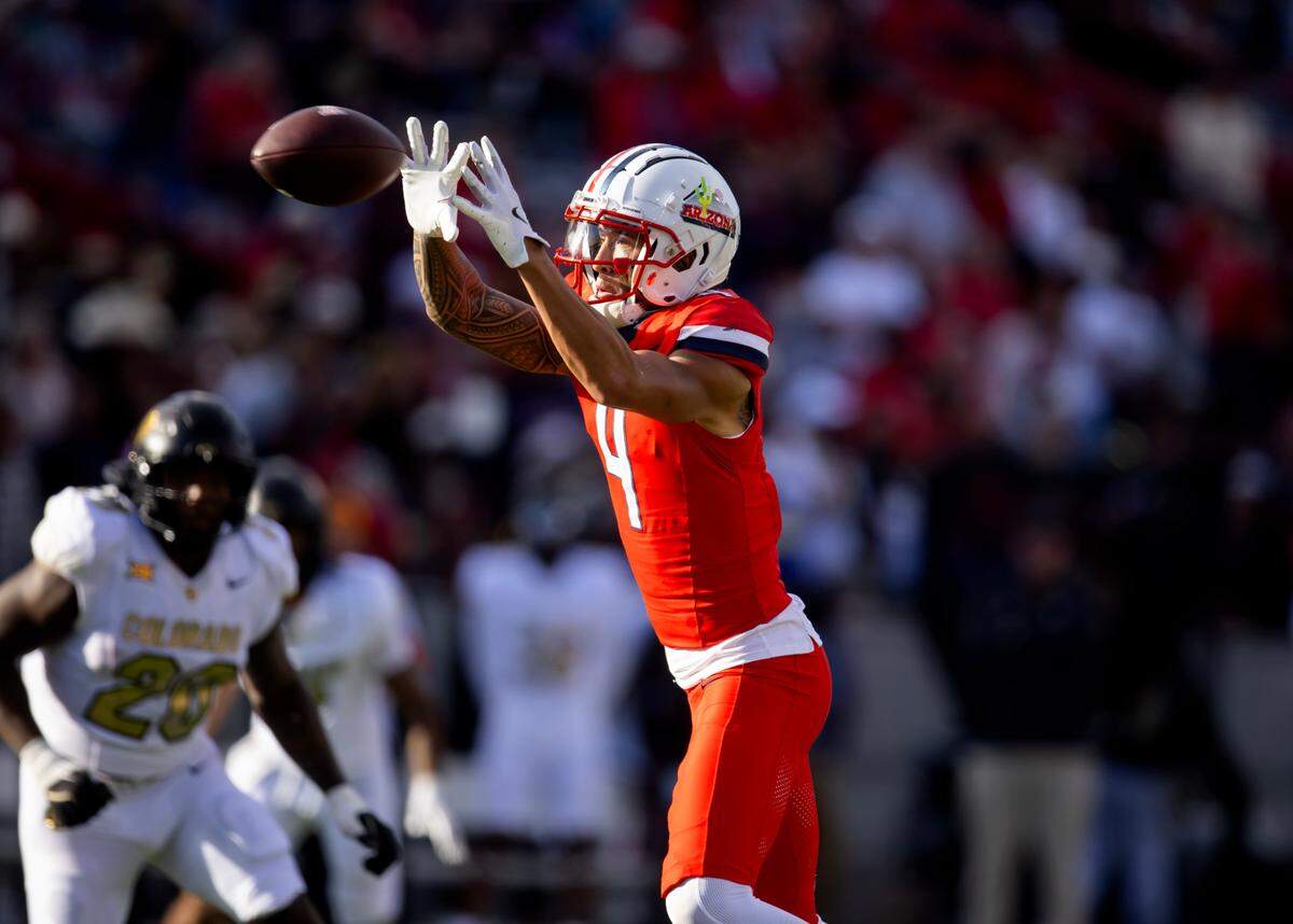 Arizona Wildcats wide receiver Tetairoa McMillan (4) against the Colorado Buffalos at Arizona Stadium. Mark J. Rebilas-Imagn Images