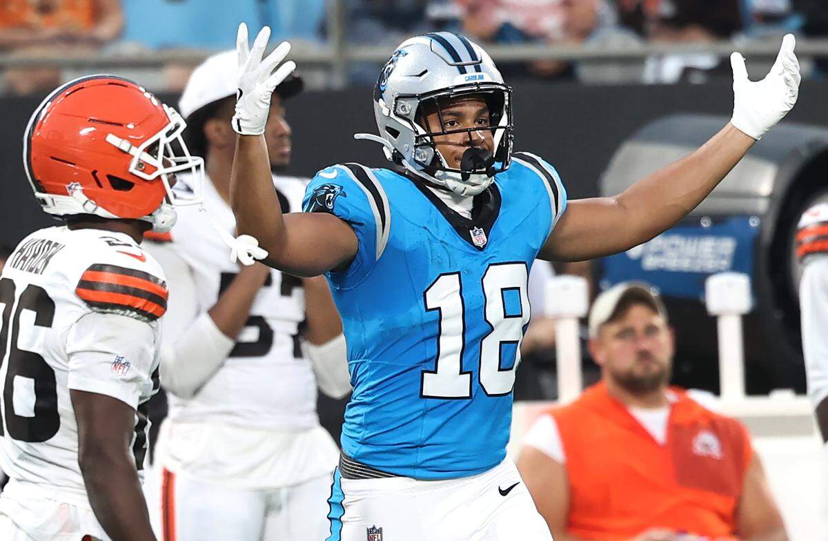 Carolina Panthers wide receiver Jalen Coker looks for a flag after fighting for position to catch a pass against Cleveland Browns cornerback Myles Harden, right, during action on Friday, August 8, 2025 at Bank of America Stadium in Charlotte, NC. 