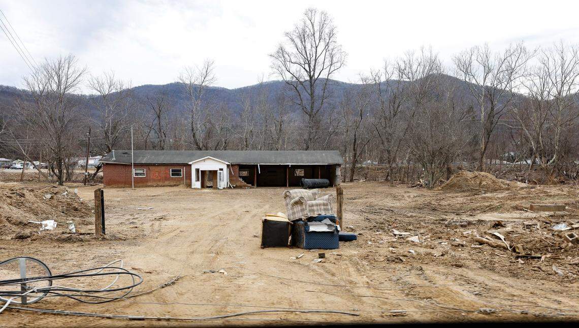 Many houses along the Swannanoa River were flooded from Helene and are uninhabitable, with families still displaced and struggling to find stable housing. 
