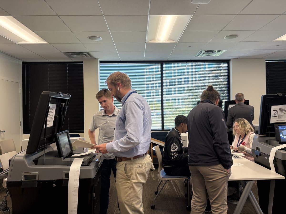 Election workers recount ballots in the Charlotte City Council District 5 Democratic primary at the Mecklenburg County Board of Elections on Tuesday.
