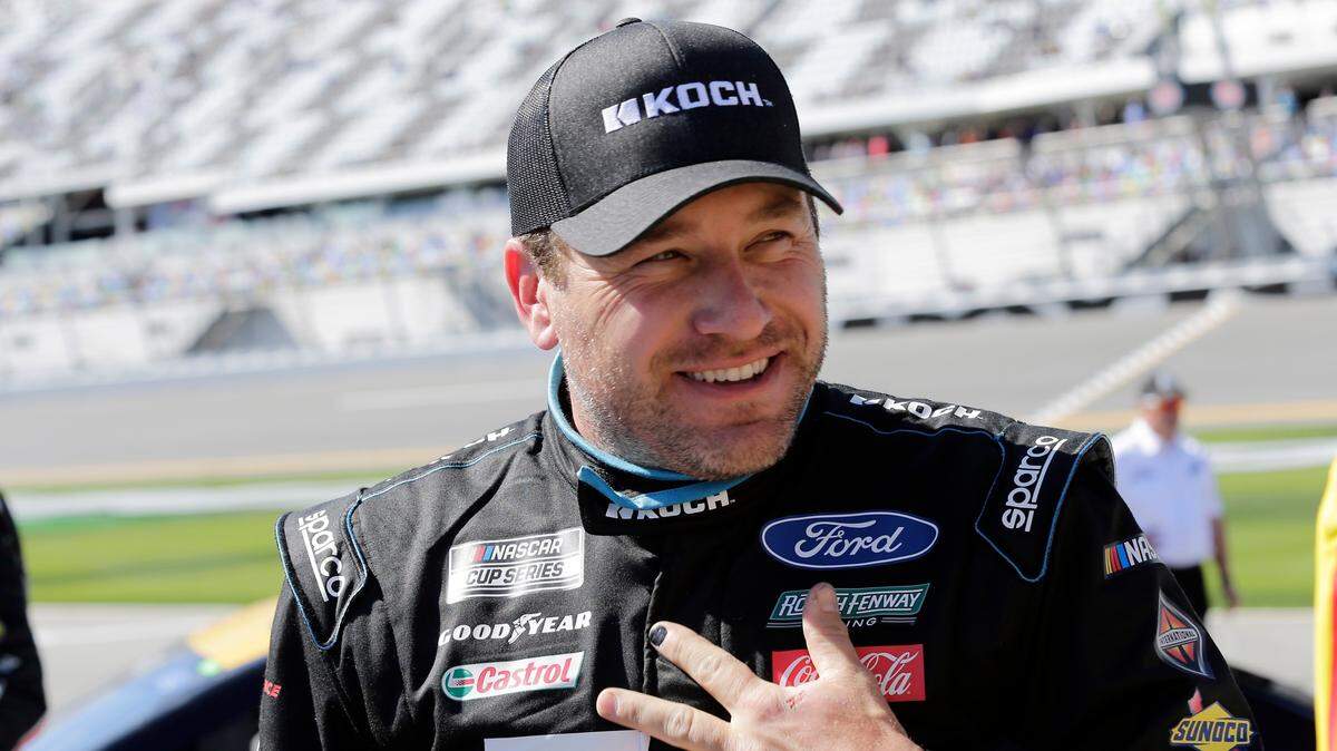 Ryan Newman stands on pit road after his run during NASCAR auto race qualifying at Daytona International Speedway, Sunday, Feb. 9, 2020, in Daytona Beach, Fla. (AP Photo/Terry Renna)