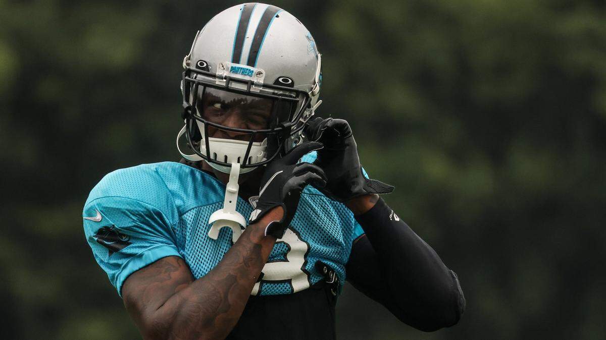 Carolina Panthers rookie Jaycee Horn adjusts his helmet during during a practice in August. Horn has an “alpha mentality,” according to Panthers GM Scott Fitterer.