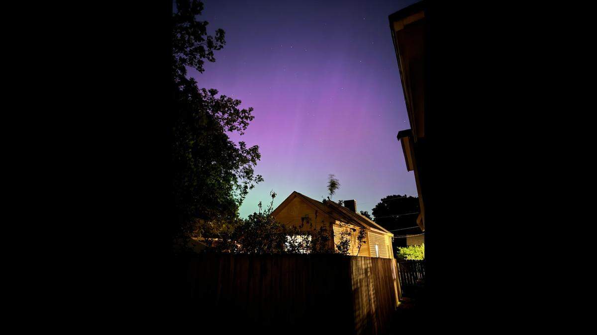 CharlotteFive editor Melissa Oyler captured this image of the northern lights late Friday, May 10, 2024, from the NoDa section of Charlotte.