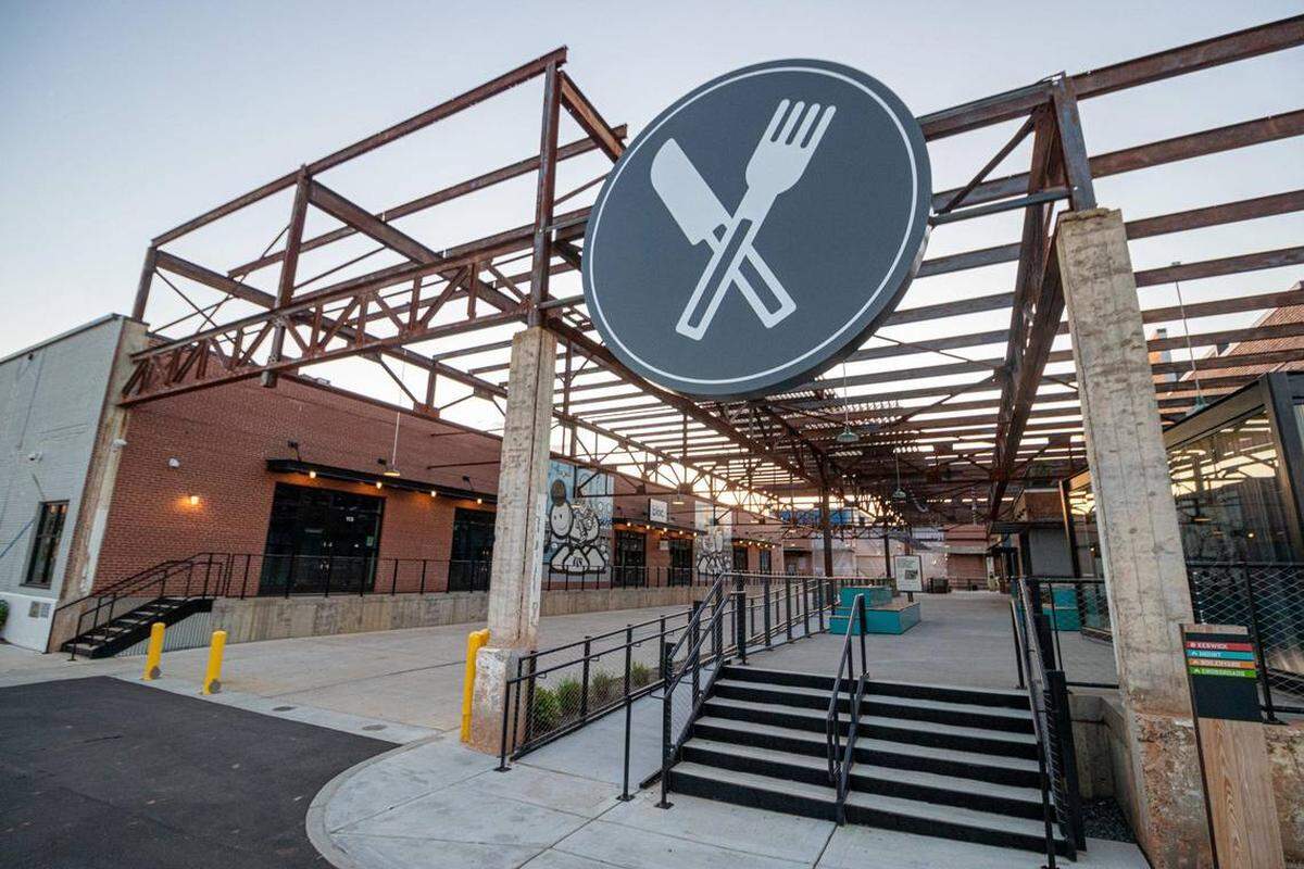 Open-air food stalls at Camp North End allow visitors to practice safe social distancing amid COVID-19.