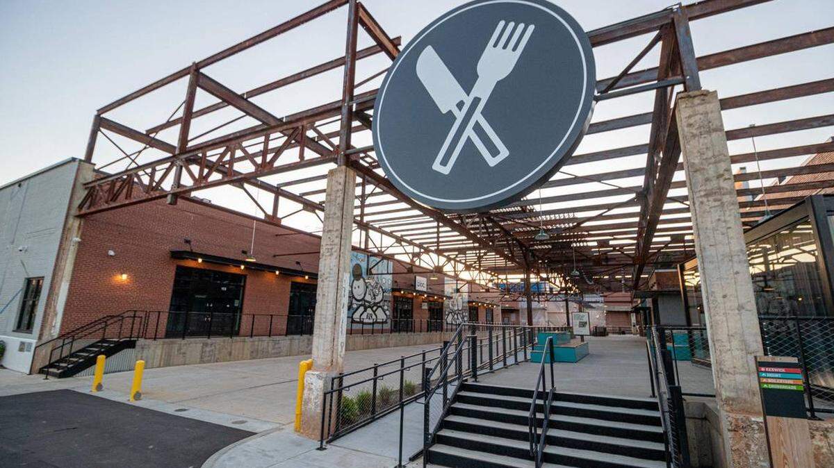 Open-air food stalls at Camp North End allow visitors to practice safe social distancing amid COVID-19.
