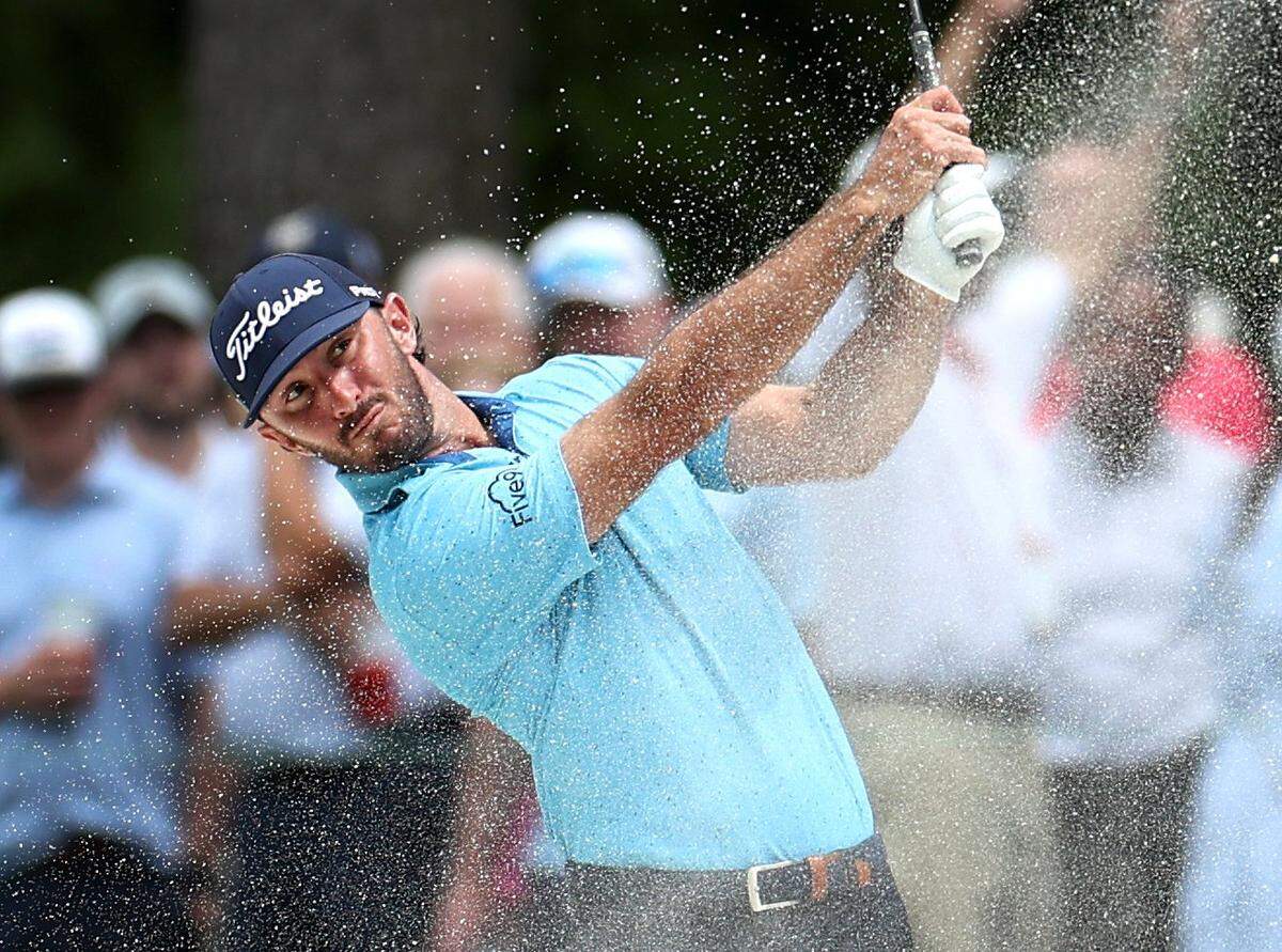 Max Homa hits his second shot from a sand trap along the 10th fairway during second round action of the Wells Fargo Championship at Quail Hollow Club in Charlotte, NC on Friday, May 10, 2024.