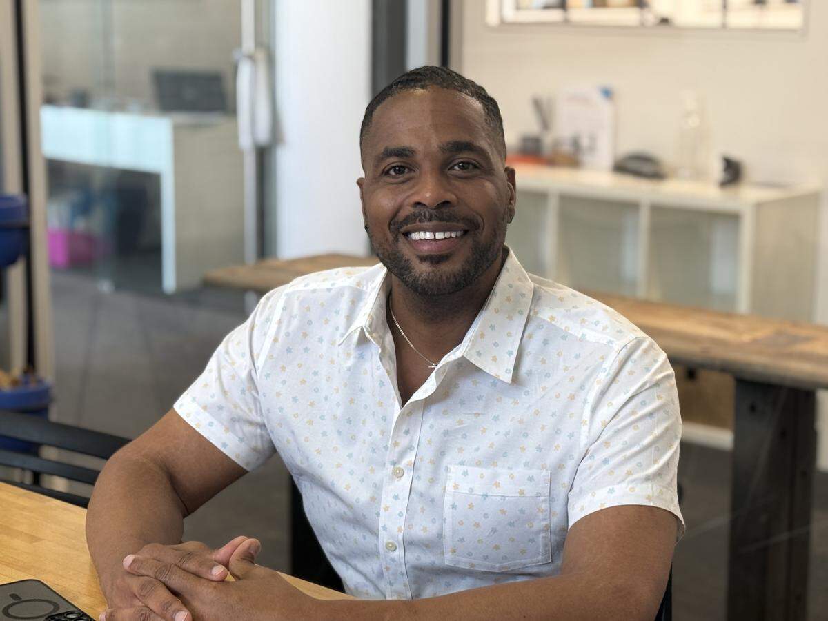 Stephan Moore, shown here in Charlotte on Monday, July 28, 2025, said he and his family are hopeful that someone in the community will give Gastonia Police a tip that will help them solve the killing of his brother, John Moore. John, a barber, was killed in his home on July 26, 2021.