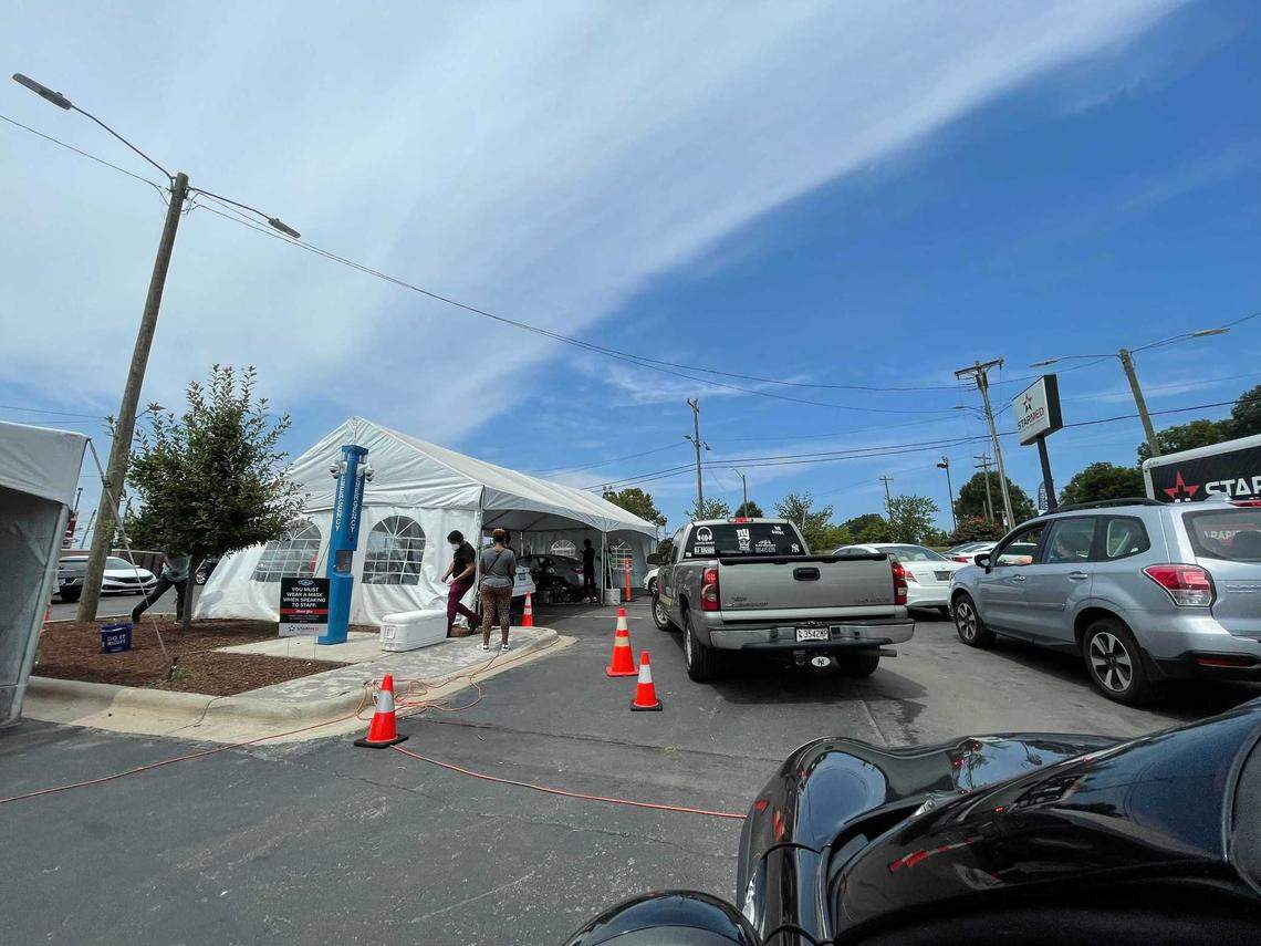 There was a line of cars waiting to get tested for COVID-19 at StarMed’s drive-thru location on Tuckaseegee Road on Aug. 11, 2021.