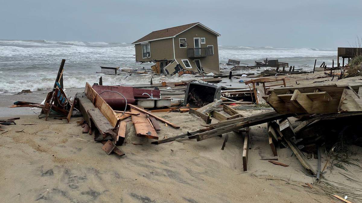 This National Park Service photo shows one of the two beach houses that collapsed into the ocean May 10 along North Carolina’s Outer Banks. Park Service officials said more are in danger of collapsing. The homes were located on Ocean Drive in Rodanthe.