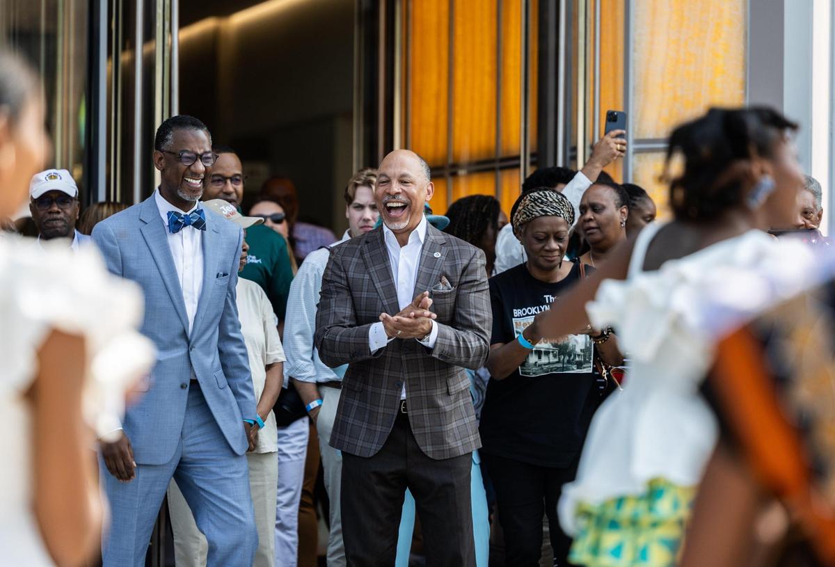 Gene Woods, CEO of Advocate Health, cheers on a performance during the grand opening of The Pearl Monday in Charlotte. The public-private partnership is led by Atrium Health and Wexford Science & Technology .