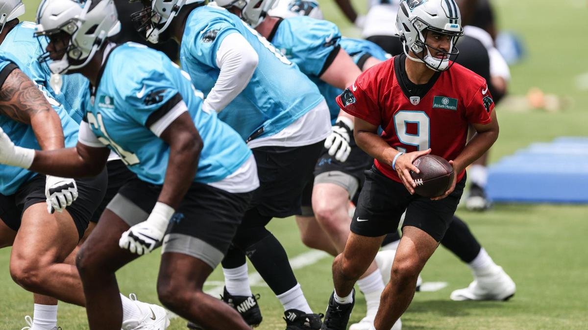 Carolina Panthers quarterback Bryce Young takes a snap at the team’s rokie minicamp Saturday.