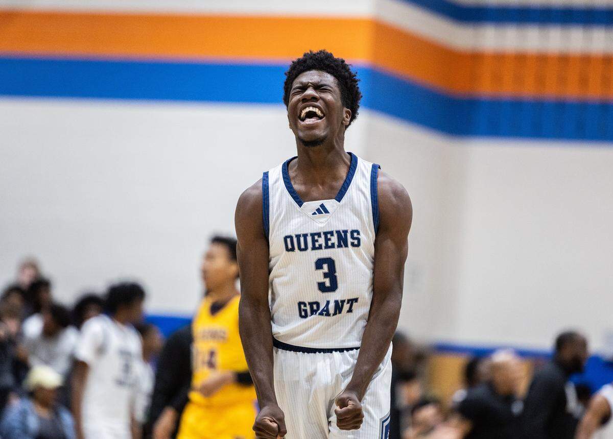 Queen's Grant Stallions player Preston Scott celebrates during the Mike Gminski Classic at Marvin Ridge High School on Dec. 29, 2025, in Waxhaw.