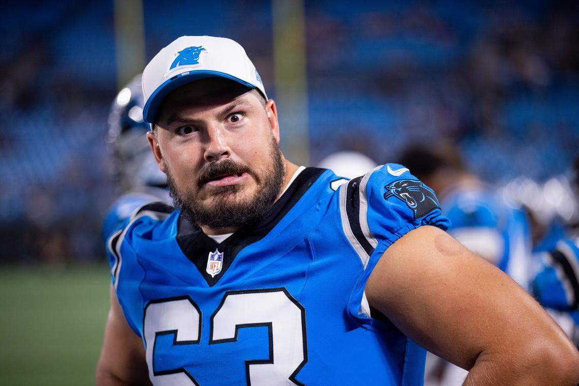 Aug 8, 2025; Charlotte, North Carolina, USA; Carolina Panthers center Austin Corbett (63) mugs for the camera during the fourth quarter against the Cleveland Browns at Bank of America Stadium. Mandatory Credit: Scott Kinser-The USAToday Network via Imagn Images