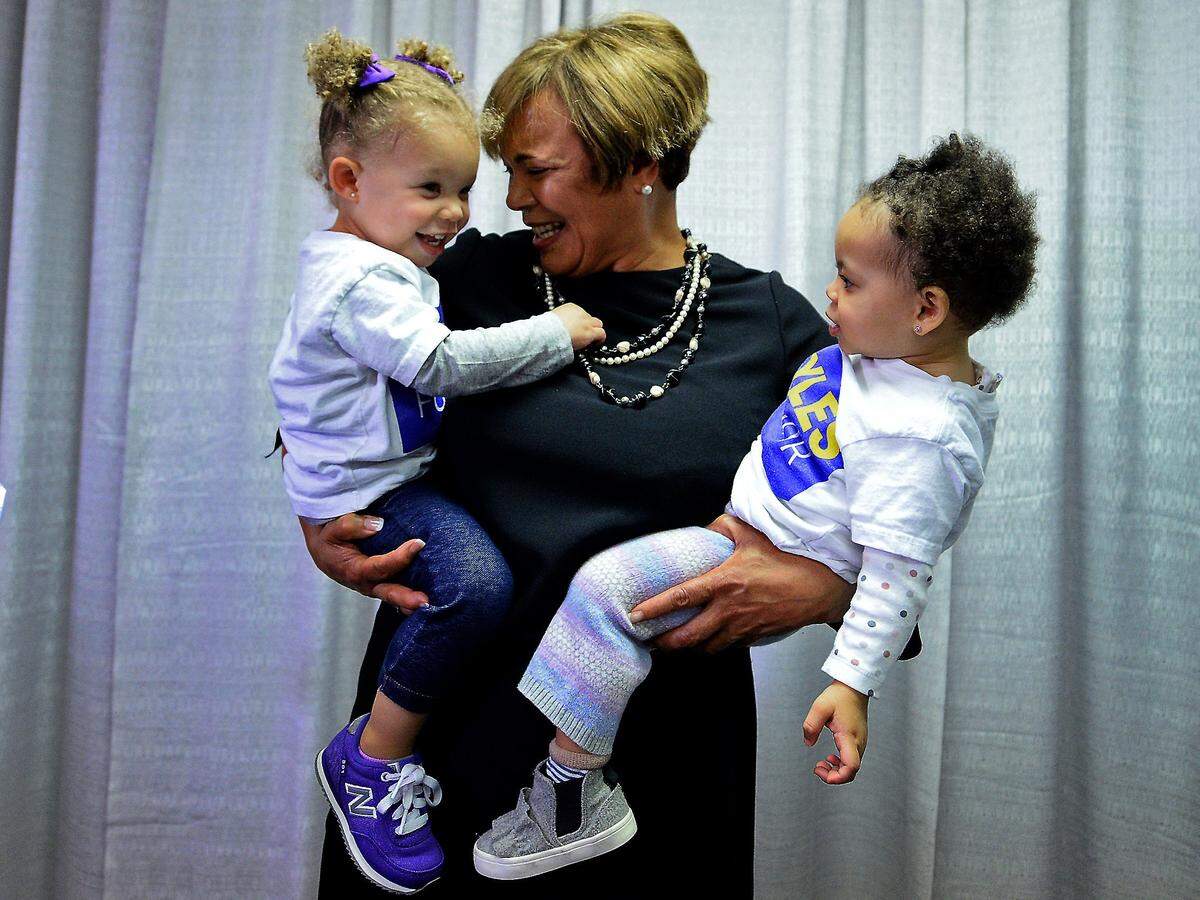 Charlotte Mayor Elect Vi Lyles celebrates her victory over challenger Kenny Smith at The Park in Charlotte, NC on Tuesday, November 7, 2017 with her granddaughters Hailey Young, left and Arya Alexander, 2 yrs.,. Lyles' victory makes her the first African American female to hold the office.