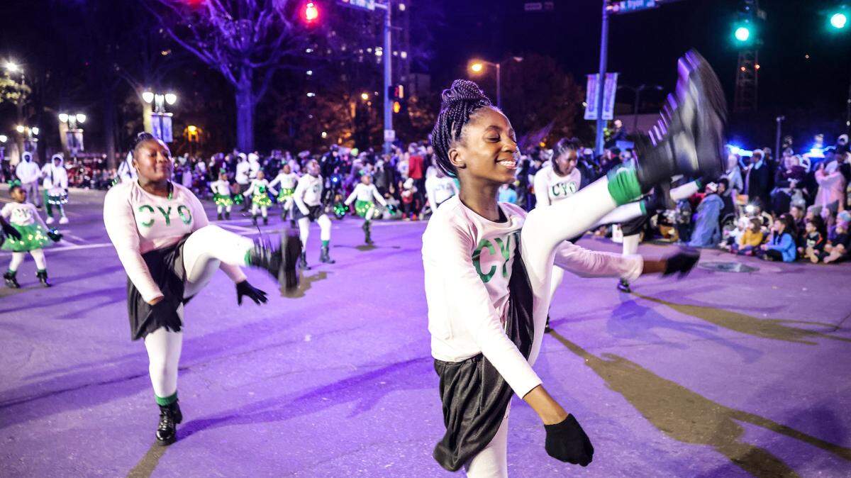 Dancers perform at the 2021 Novant Health Thanksgiving Parade in uptown Charlotte.