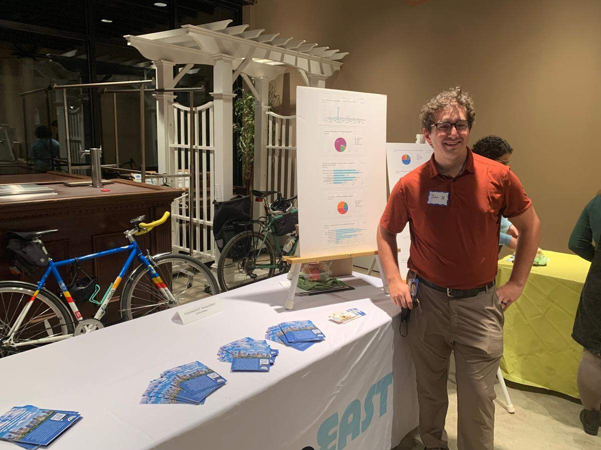 John Holmes, member of the CharlotteEAST transportation committee and the City of Charlotte Bicycle Advisory Committee, informs East Charlotte residents about transit in the area during a transportation and economic development forum held by CharlotteEAST on Thursday, Sept. 29, 2022.