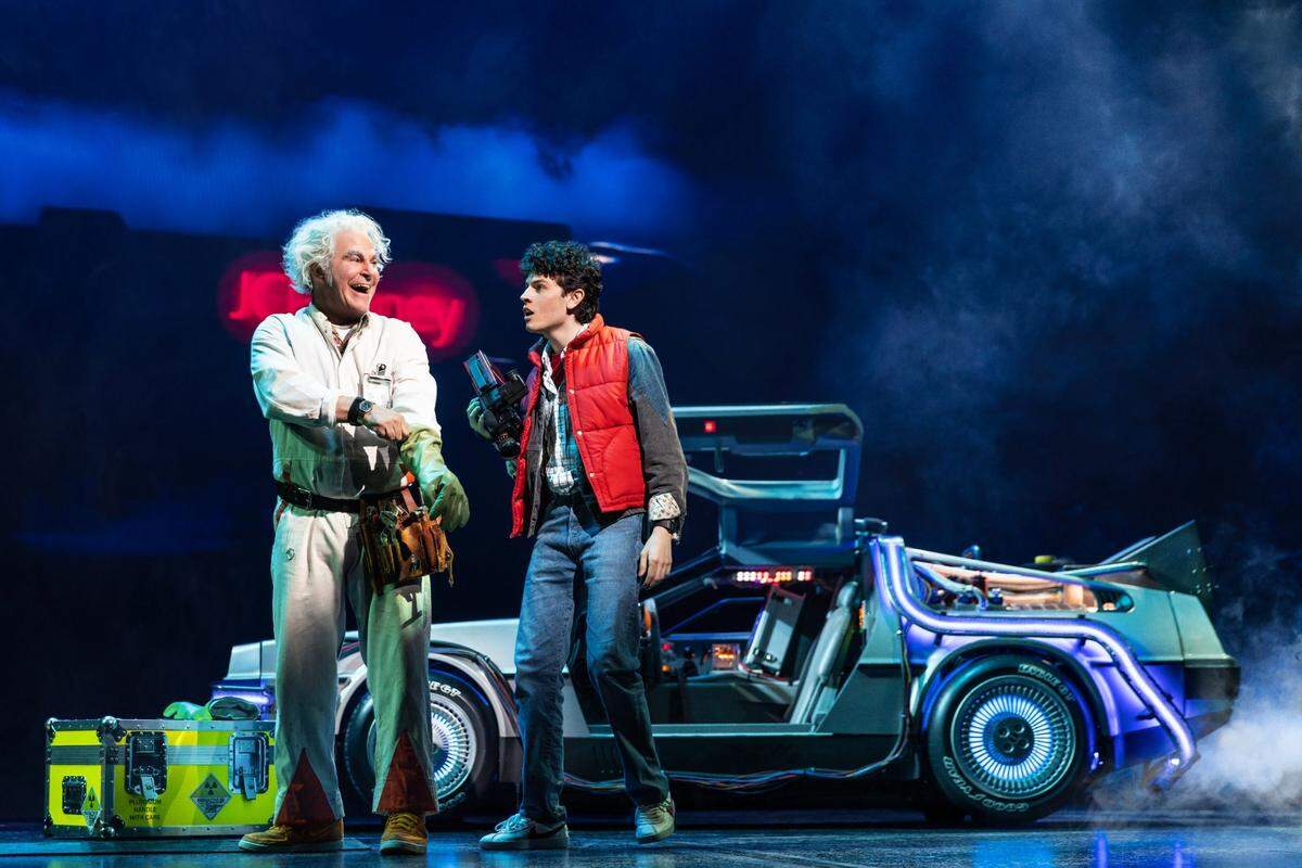 Roger Bart, left, and Casey Likes star in the Broadway production of “Back to the Future: The Musical.”