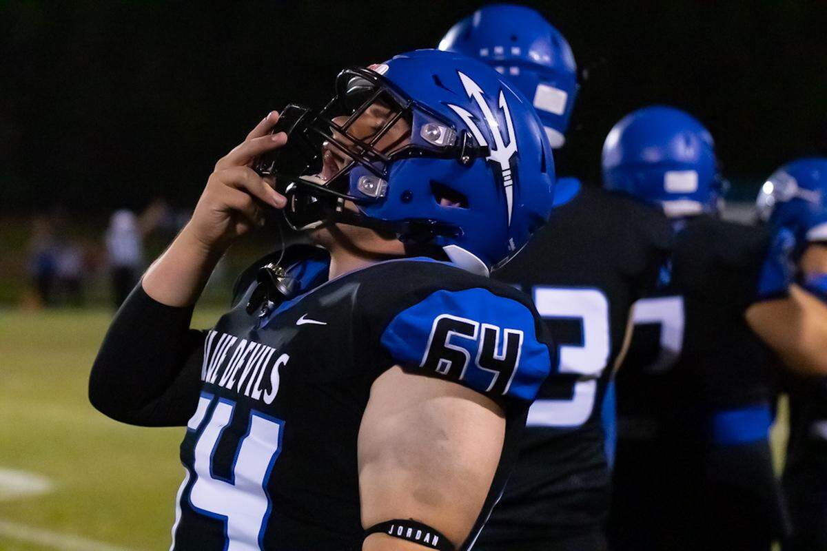 Blue Devil Players screams with excitement as the buzzer goes off.