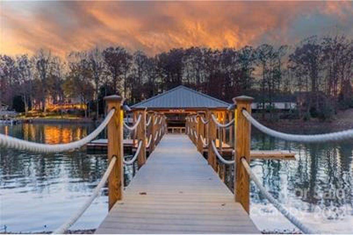This is the dock of the Lake Norman mansion for sale at 251 Gainswood Drive in Mooresville.