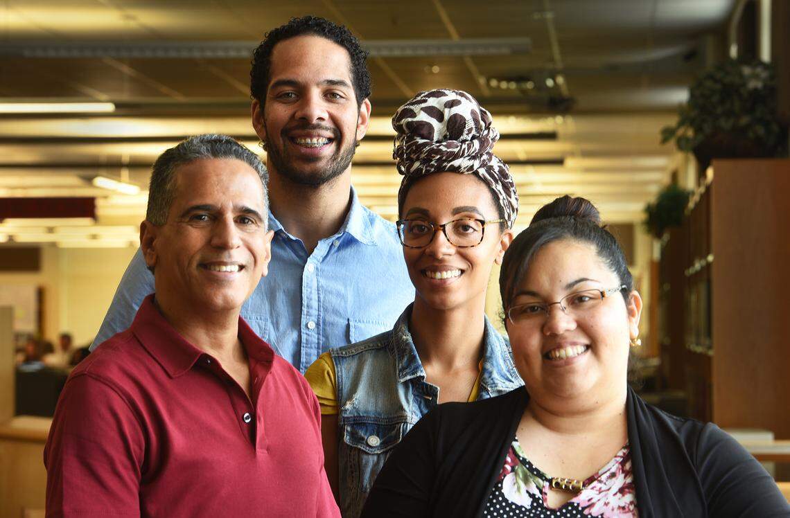 CMS principals-in-training (from left ) Francisco Flores, a teacher at Grier Academy; Domingo Figueroa, a teacher at Oaklawn Language Academy; Dominique Veloz, a teacher at Hough High; and Alis Mulero, dual language coordinator at Starmount Academy, take a break from a UNCC summer leadership class at Mallard Creek High.