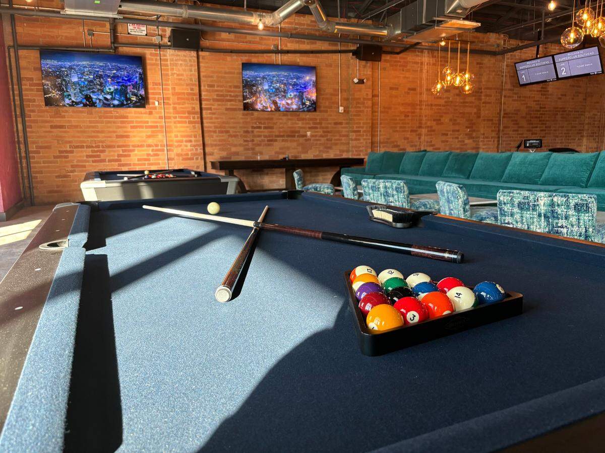 SupperClub SouthEnd offers wood-fired food paired with craft cocktails, plus duckpin bowling, pool and other games.