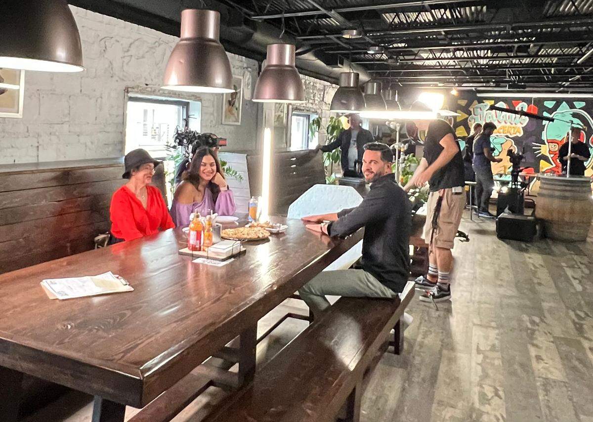 Jesús Diaz films an episode of “Que Delicia: El Sabor De America” at Salud.