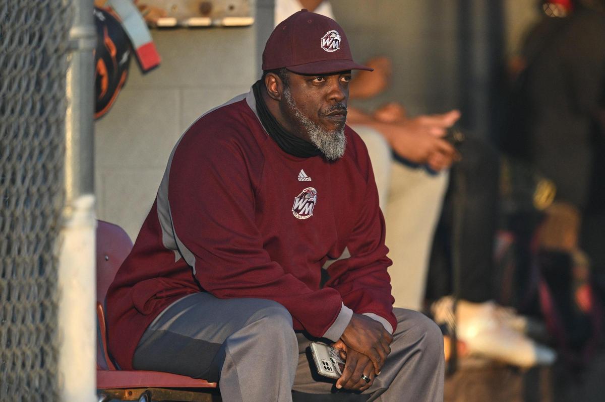 West Mecklenburg’s head coach Ramon Allen Sr. looks on during a varsity baseball game against West Charlotte, Tuesday, March 18, 2022, in Charlotte, N.C. (Charlotte Observer/Matt Kelley)